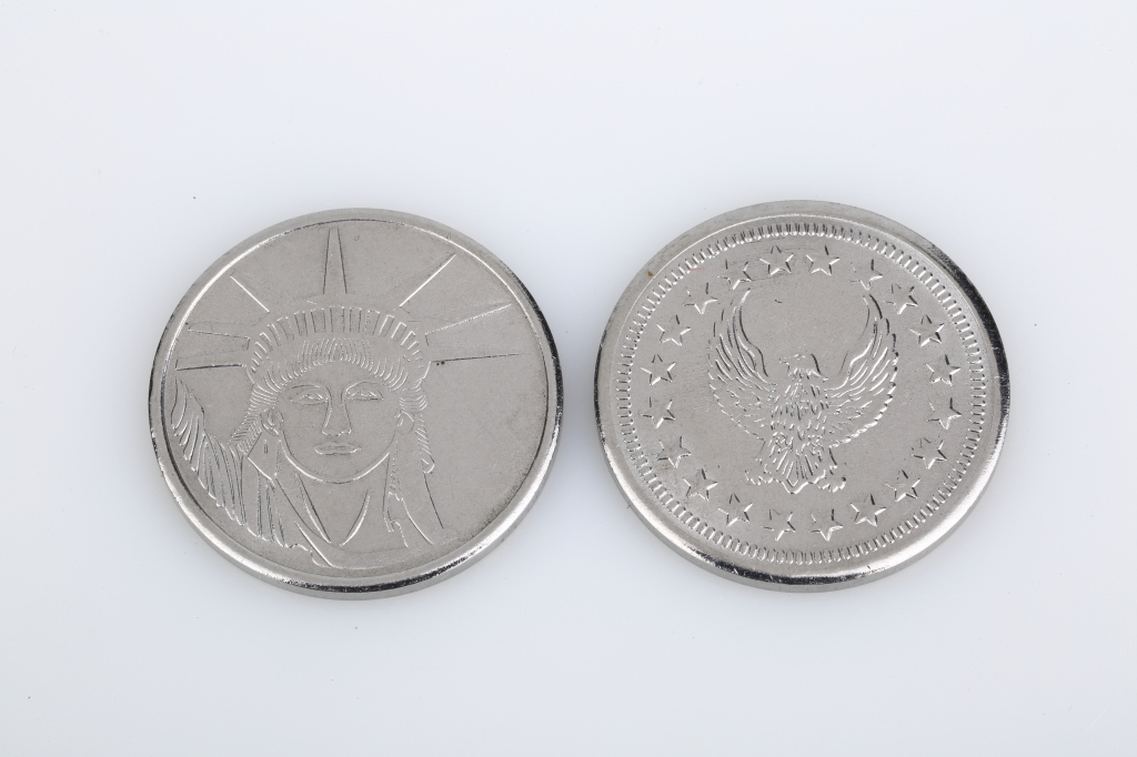 coin with eagle and stars on both sides